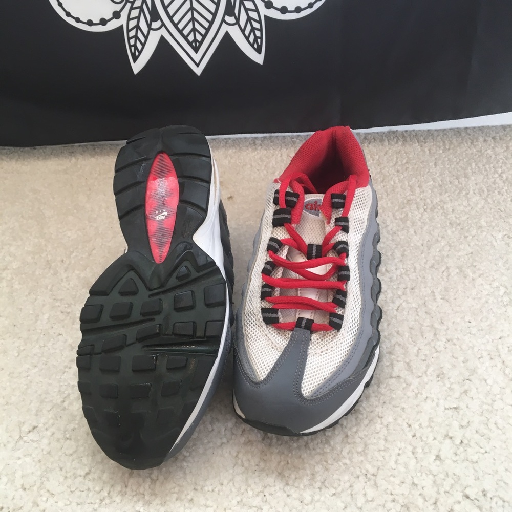 Red, black, white, and grey Nike Airmax